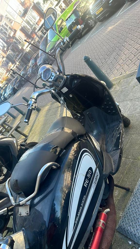 turbho scooter , blauw  2012 zwart heeft 6.000 km op teller, Fietsen en Brommers, Scooters | SYM, Gebruikt, Allo, Benzine, Maximaal 25 km/u
