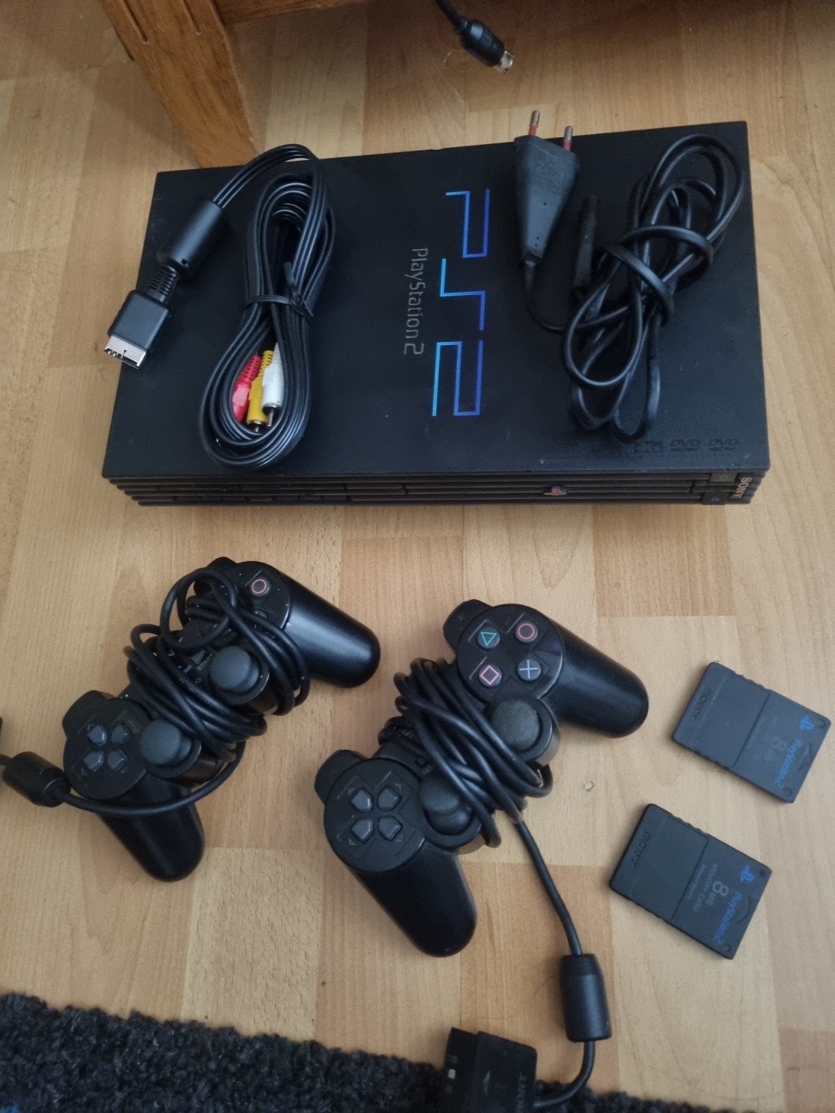 Sony PlayStation 2 (PS2) SCPH-50004 met 2 controllers, Ophalen