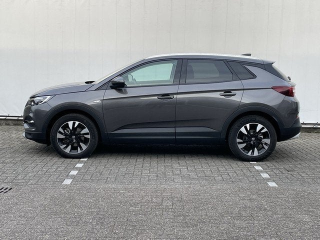 Opel Grandland X 1.2 Turbo Elegance Automaat met Navi/Camera, Auto's, Opel, 12 maanden, Gebruikt, 1199 cc, Leder en Stof