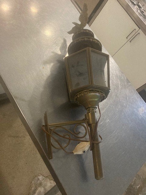 Koetslamp, Ophalen