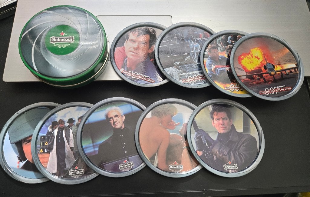 Blik met 9 metalen bierviltjes  Heineken James Bond, Ophalen, Zo goed als nieuw, Viltje(s), Heineken
