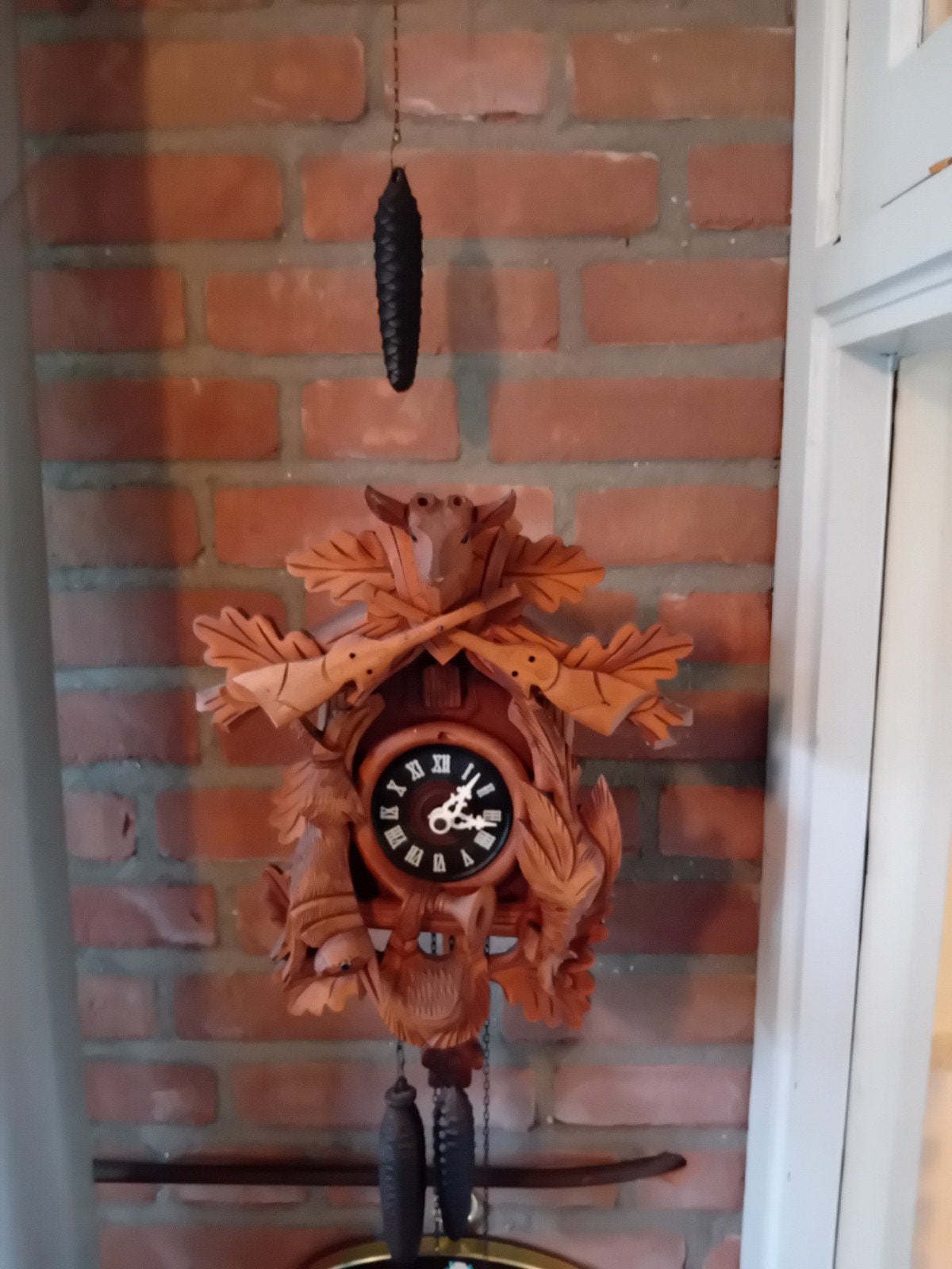 Antieke Koekoeksklok met Jachttafereel, Ophalen