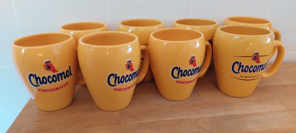 Set van 8 Chocomel mokken - Zo goed als nieuw, Ophalen of Verzenden, Zo goed als nieuw, Overige stijlen, Kop(pen) en/of Schotel(s)