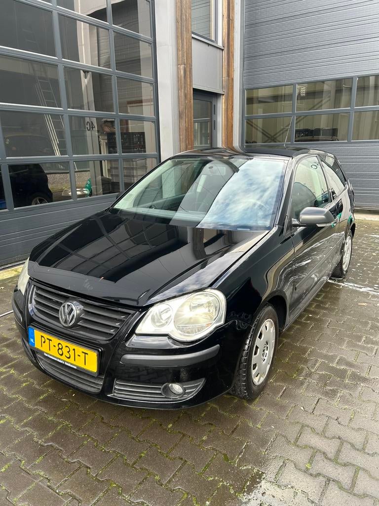 Volkswagen Polo 1.2 2006 APK VERLOPEN 196725KM, Auto's, Voorwielaandrijving, Stof, 1198 cc, Zwart