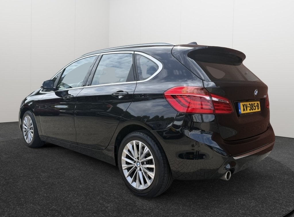 BMW 2 Serie Active Tourer 218i Executive Edition Automaat Le, Auto's, 12 maanden, Gebruikt, Euro 6, Zwart