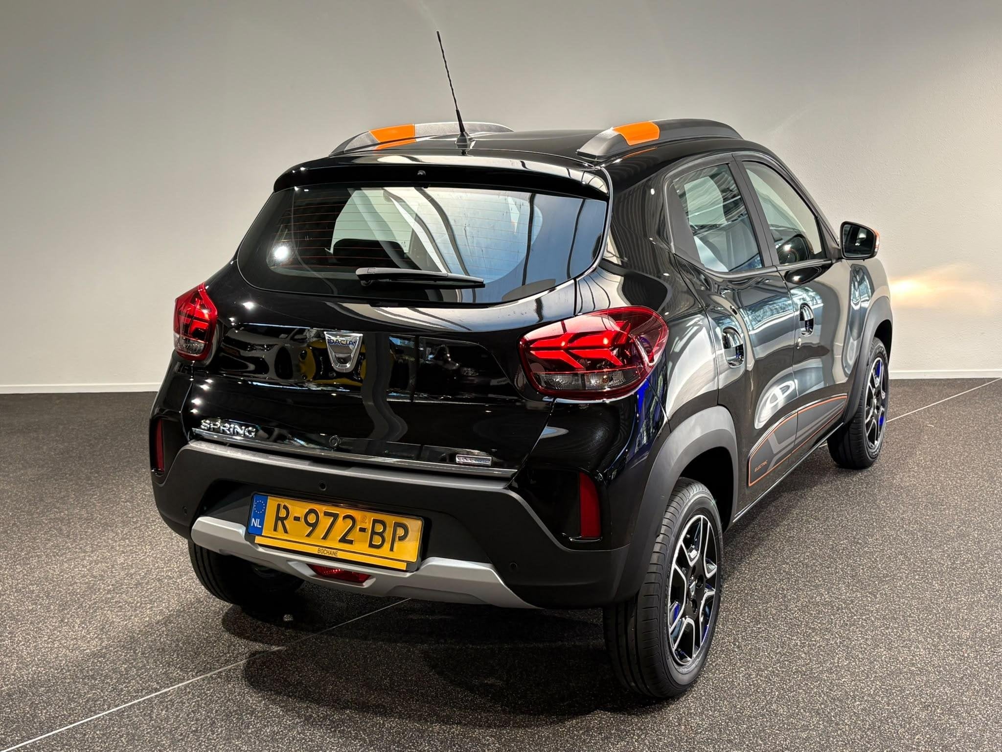 Dacia Spring Comfort Plus 27 kWh | Navigatie | Airco | Camer, Auto's, Gebruikt, Huisgarantie, Parkeercamera, Met garantie (alle)