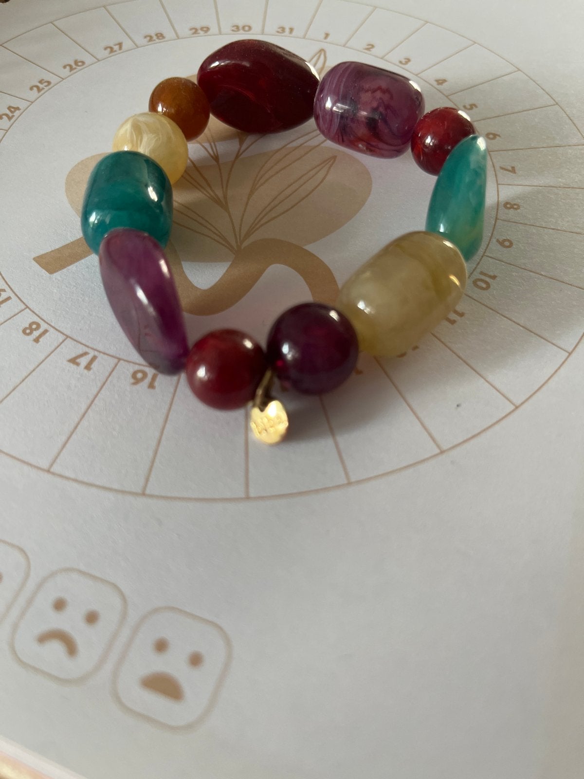 Kleurrijke kralenarmband met gouden bedel Biba, Overige materialen, Overige kleuren, Ophalen of Verzenden, Zo goed als nieuw
