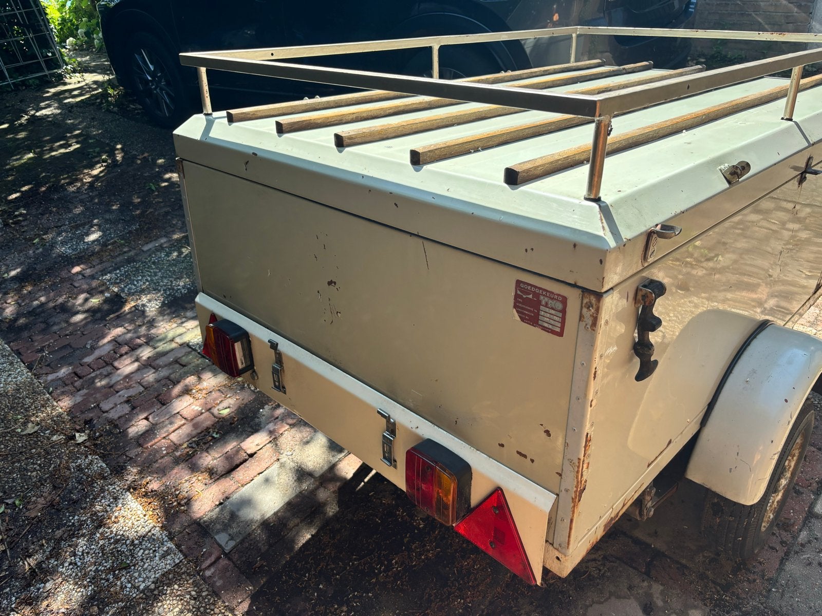 Compacte aanhangwagen met imperiaal, Ophalen, Gebruikt