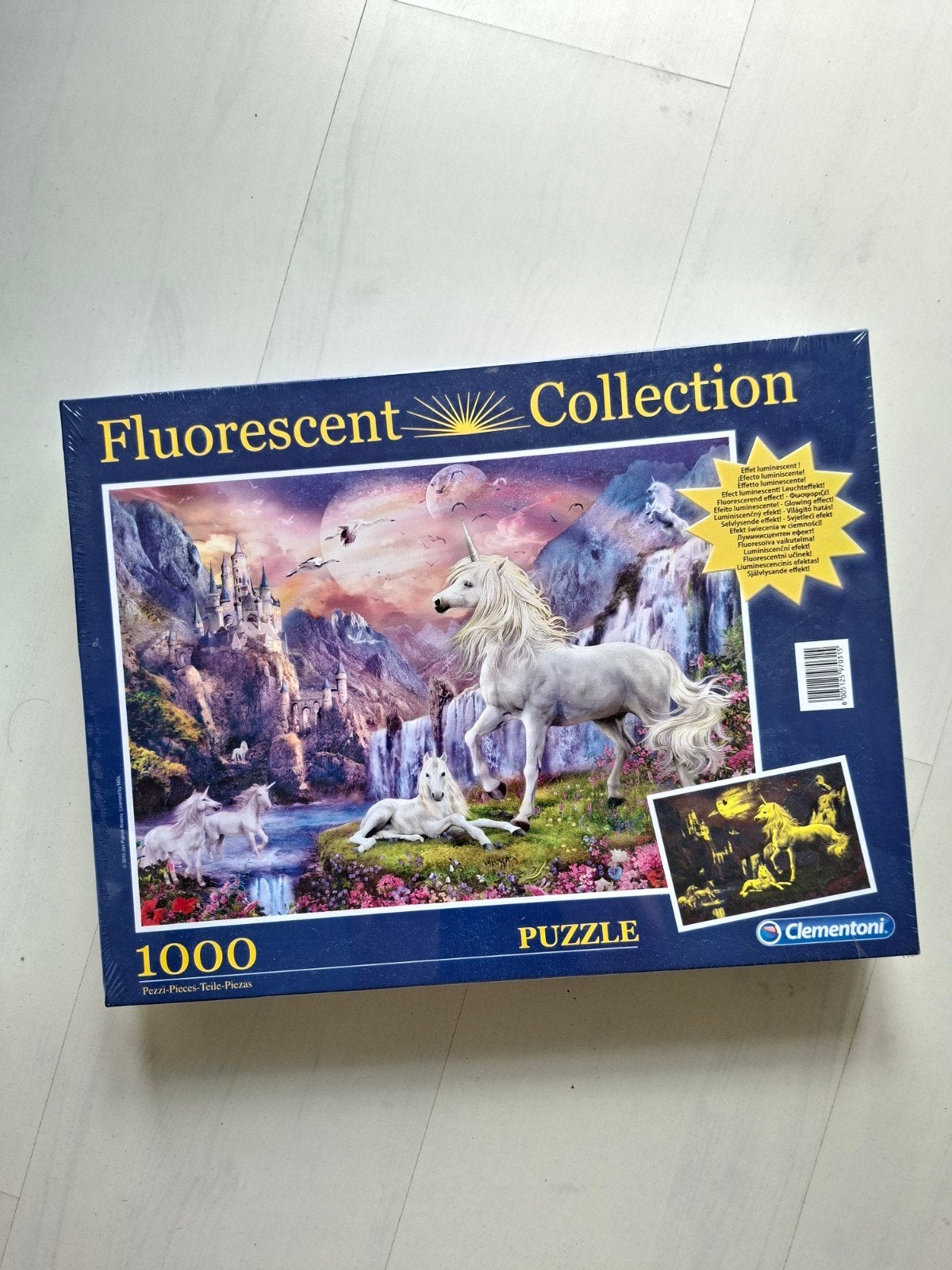 Clementoni Fluorescent Collectio Eenhoorn Puzzel 1000 stukje, Ophalen of Verzenden, 500 t/m 1500 stukjes, Nieuw, Legpuzzel