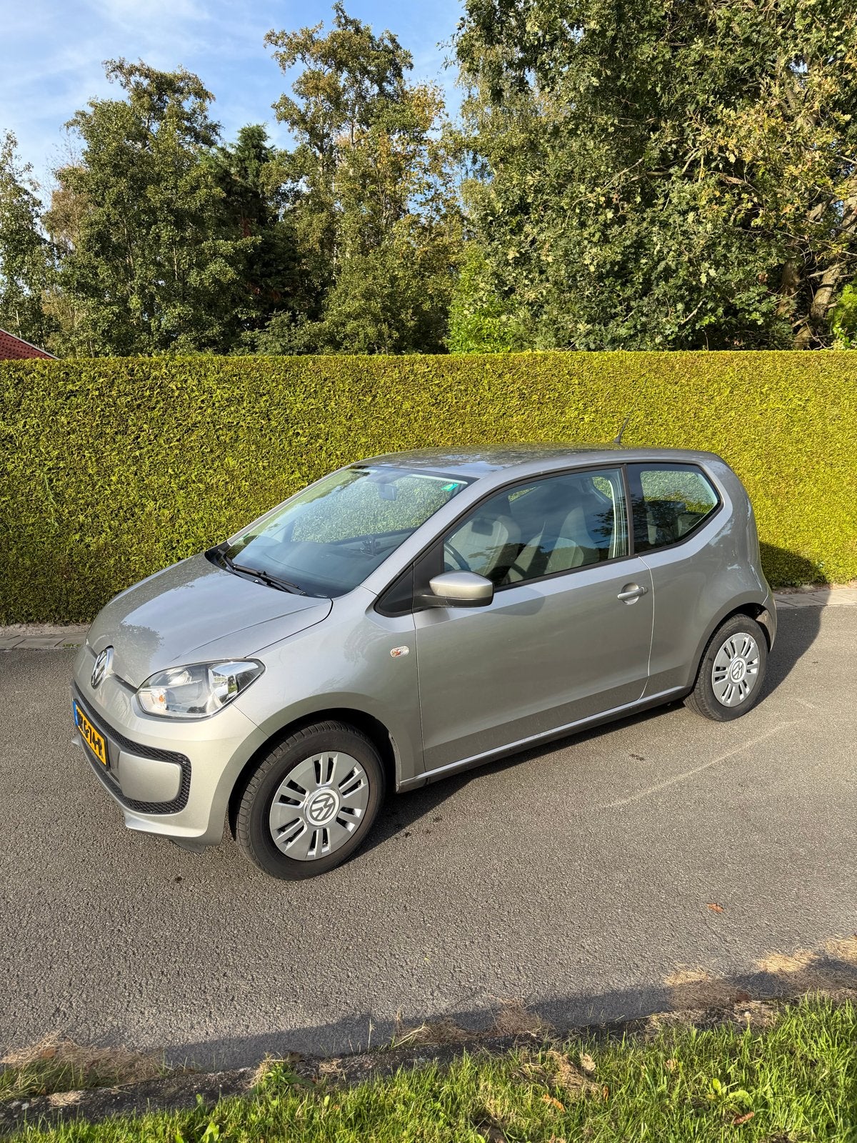 Volkswagen up! 1.0 44KW 2012 Grijs, Auto's, Voorwielaandrijving, Stof, Up!, Handgeschakeld