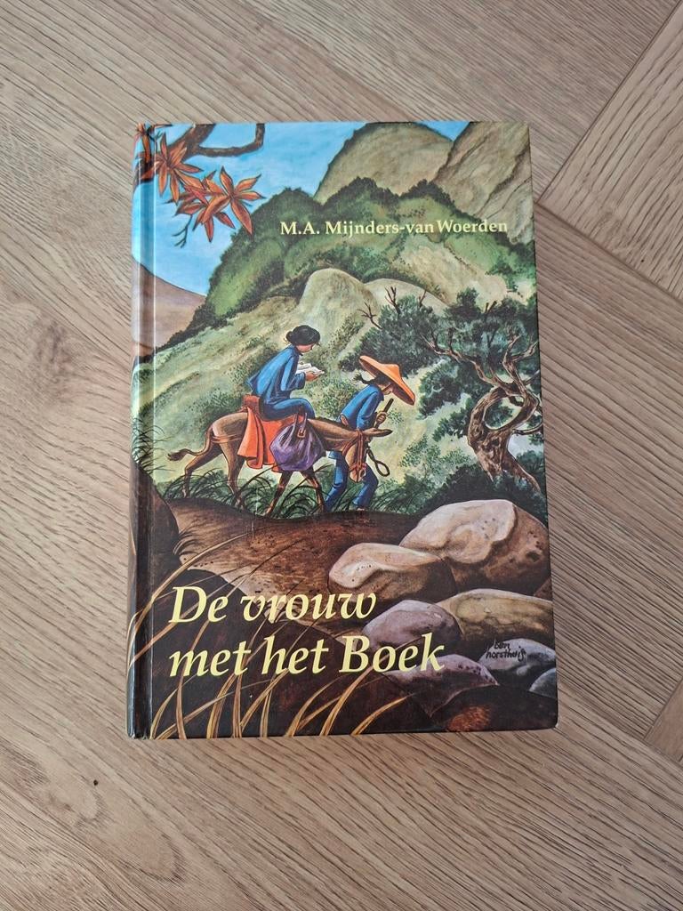 M.A. Mijnders-van Woerden - De vrouw met het Boek, Ophalen of Verzenden, Zo goed als nieuw, M.A. Mijnders-van Woerden