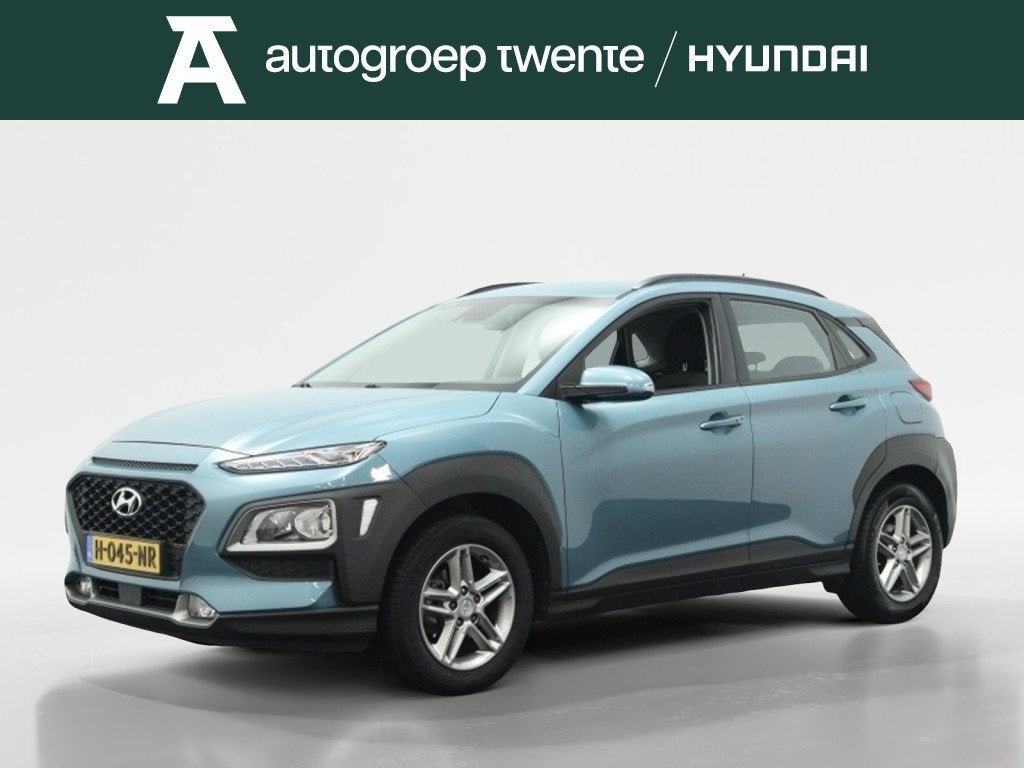 Hyundai KONA 1.0 T-GDI Essence luxe | Keyless | Carplay navi, Auto's, Keurmerk '100% Onderhouden', 12 maanden, Stof, Gebruikt