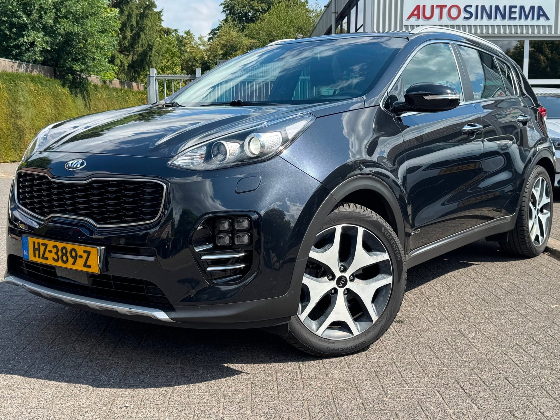Kia Sportage 1.6 T-GDI 4WD GT-Line PlusLine | Afn. Trekhaak, Auto's, Kia, Bi-Xenon koplampen, Gebruikt, 4 cilinders, Zwart