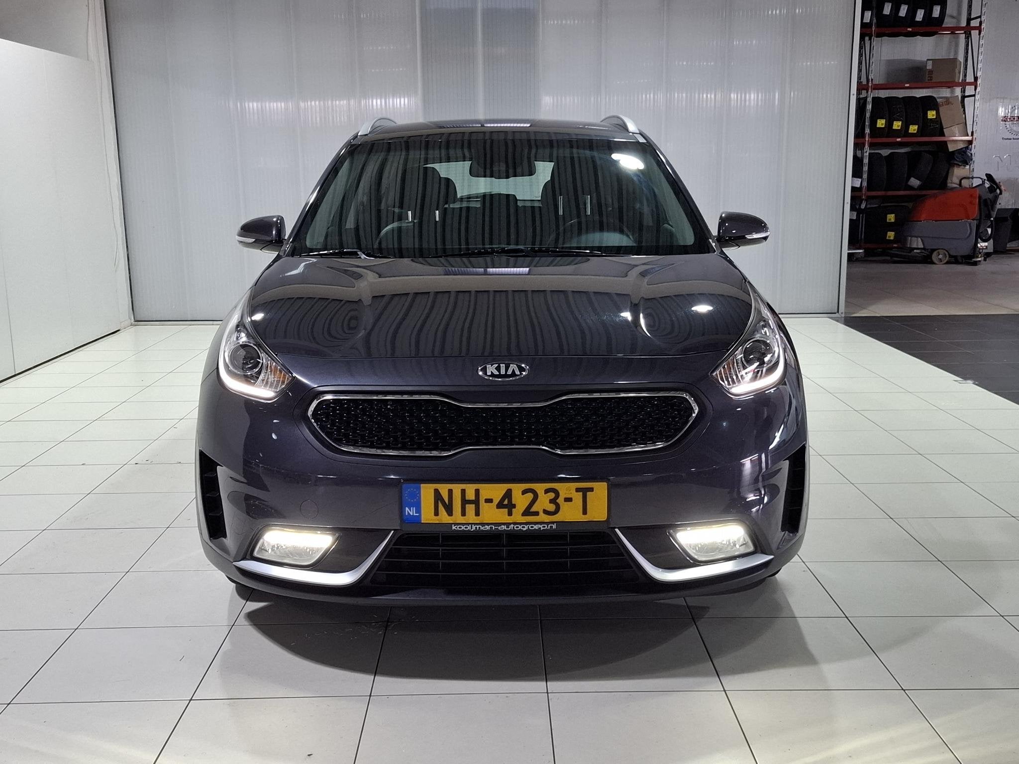 Kia Niro 1.6 GDi Hybrid First Edition Apple Carplay/Android, Auto's, Gebruikt, Euro 6, 2 kWh, Leder en Stof