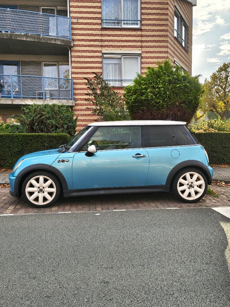 Mini Cooper 1.6 16V bouwjaar 2004 Blauw, Auto's, Voorwielaandrijving, Xenon verlichting, 4 cilinders, Leder en Stof