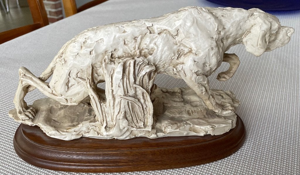 Antiek beeld van jachthond, Ophalen