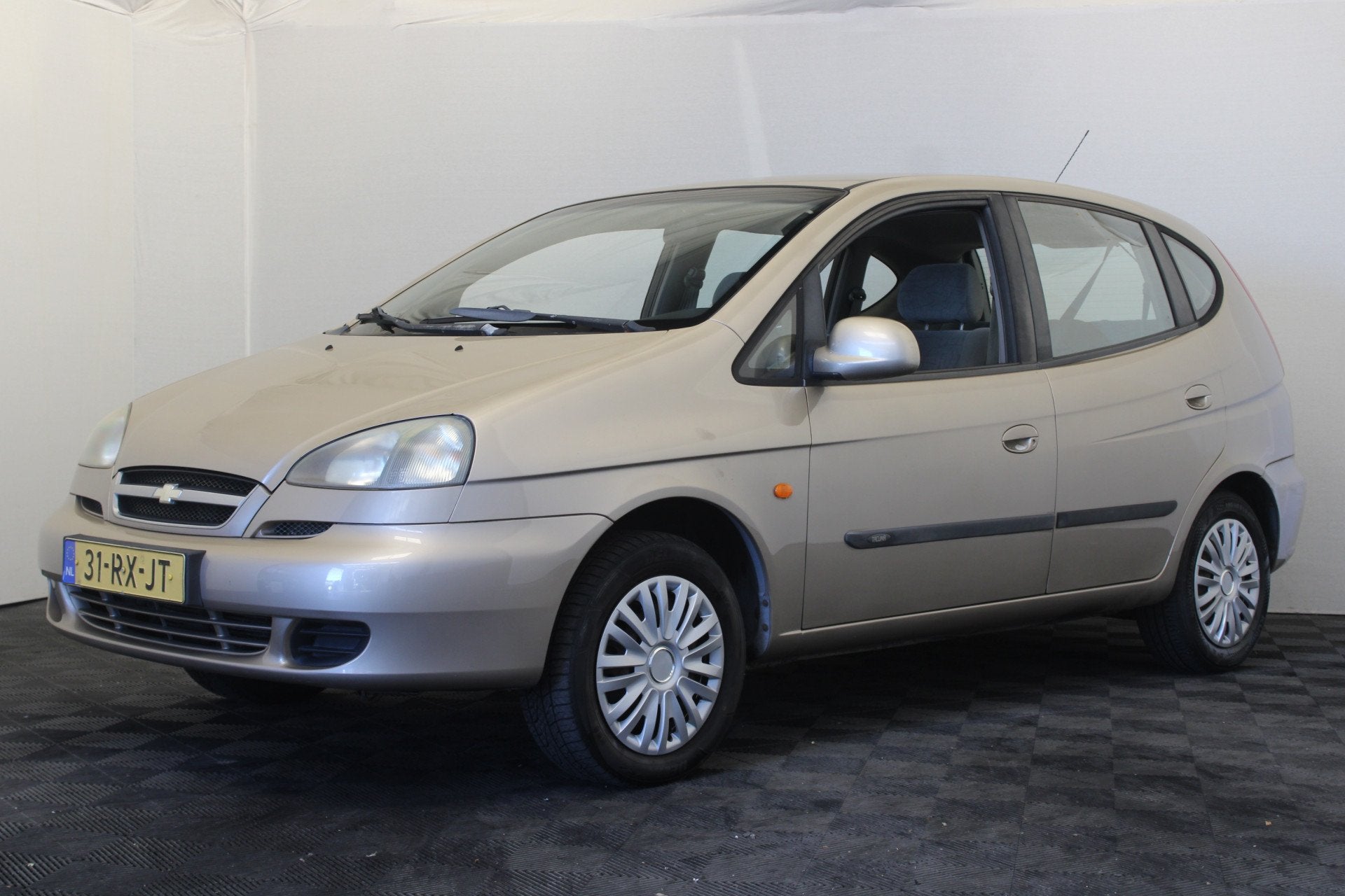 Chevrolet Tacuma 1.6-16V Spirit (bj 2005), Auto's, Chevrolet, Voorwielaandrijving, Stof, Gebruikt, Beige