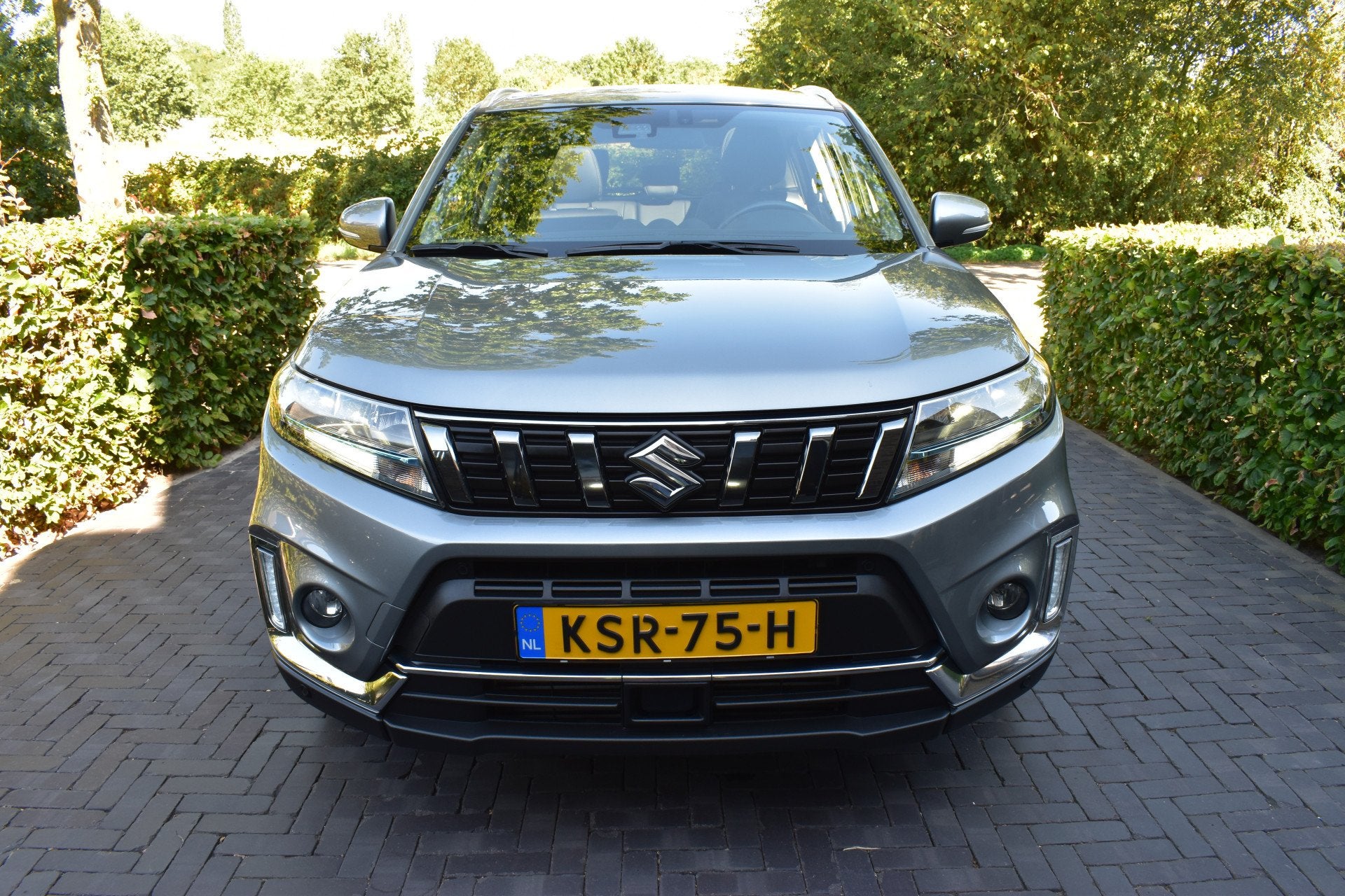 Suzuki Vitara 1.4 Boosterjet Style Hybrid Pano Leer NIEUWST!, Dealer onderhouden, Gebruikt, 4 cilinders, Leder en Stof