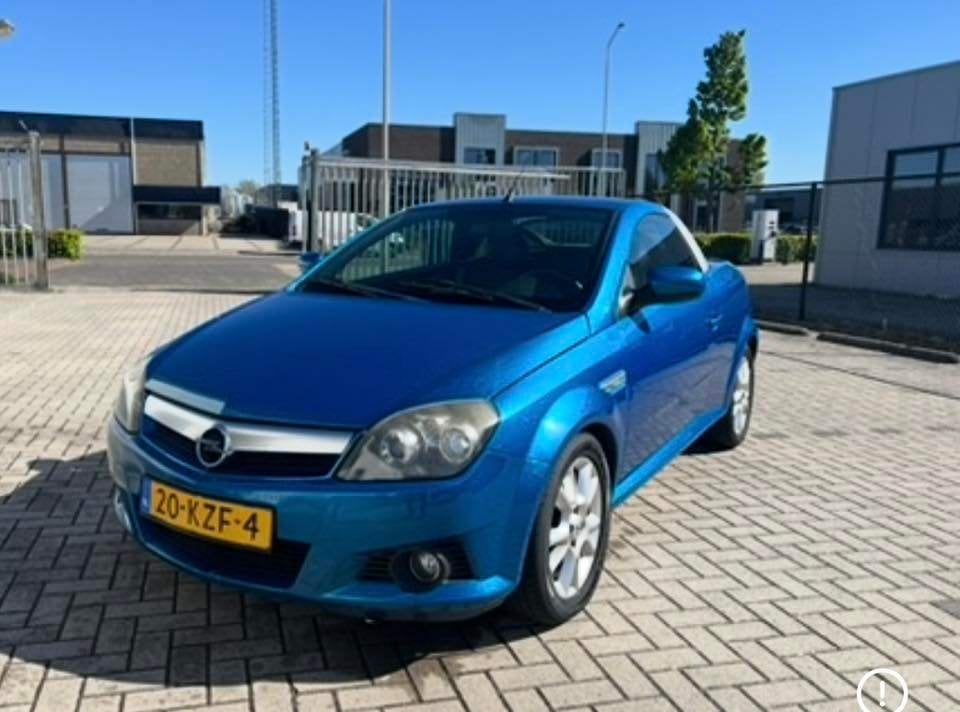 Opel Tigra 1.4 16V Twintop 2006 Blauw, Auto's, Voorwielaandrijving, Zwart, 4 cilinders, Cabriolet