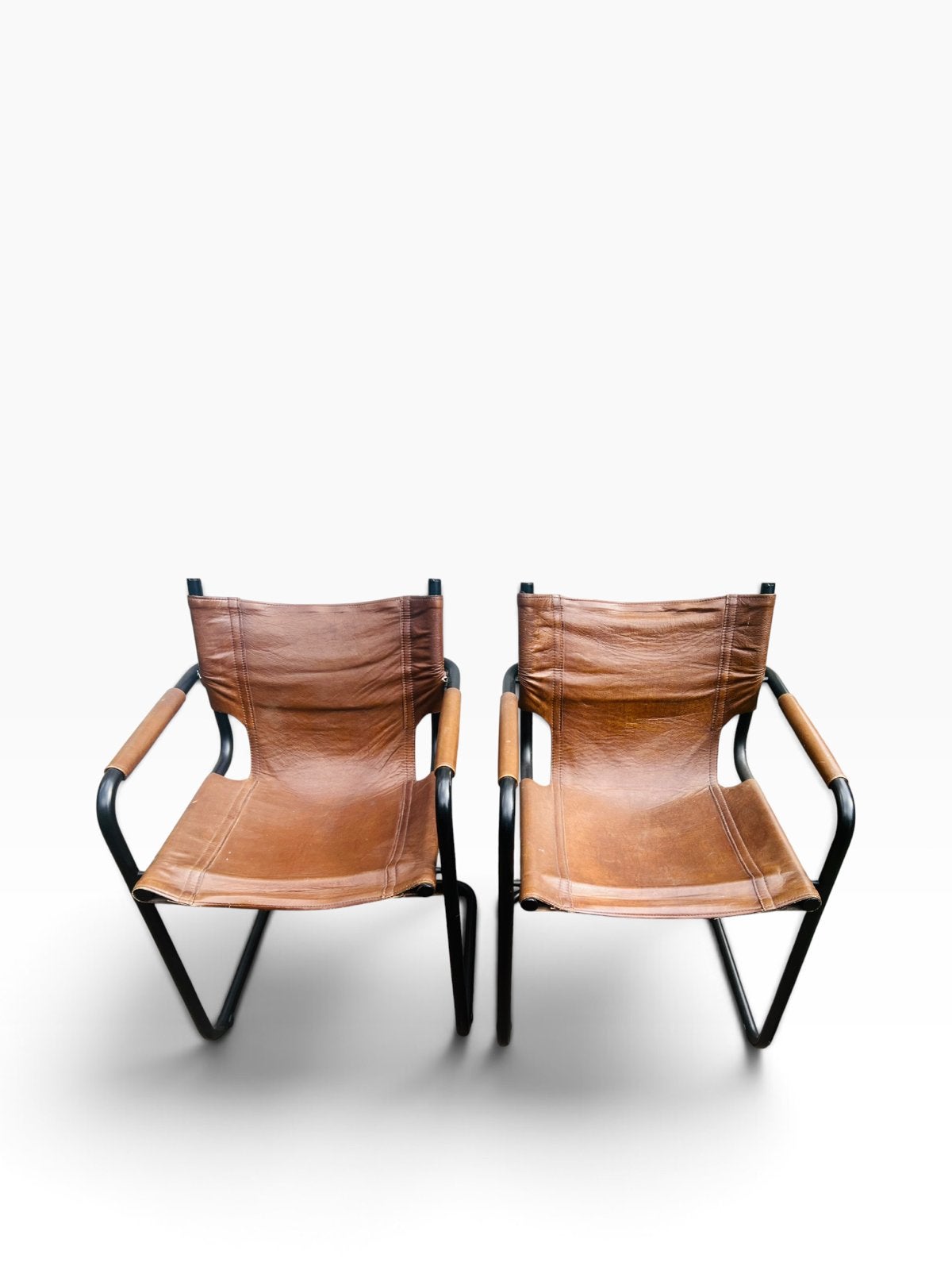 Vintage buisframe bruine stoelen van tuigleer Italie, Twee, Bruin, Ophalen of Verzenden, Zo goed als nieuw