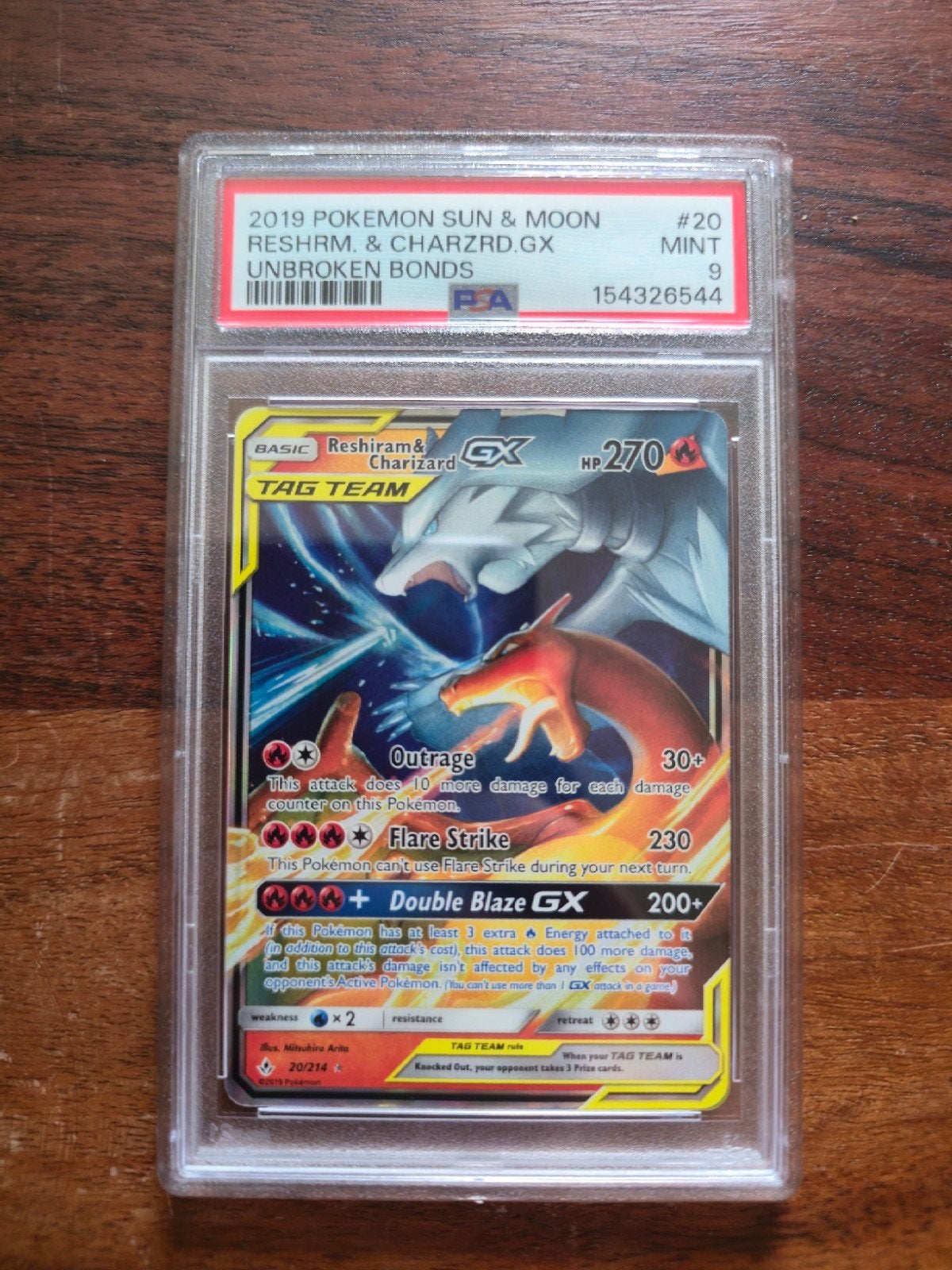 PSA 9 Reshiram & Charizard GX 2019 Pokemon Sun & Moon, Ophalen of Verzenden, Zo goed als nieuw, Losse kaart