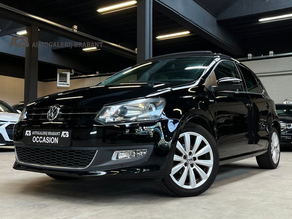 Volkswagen Polo 1.2 TSI Highline Automaat/Pano/Navi/, Auto's, Volkswagen, Gebruikt, Zwart, 4 cilinders, Leder en Stof