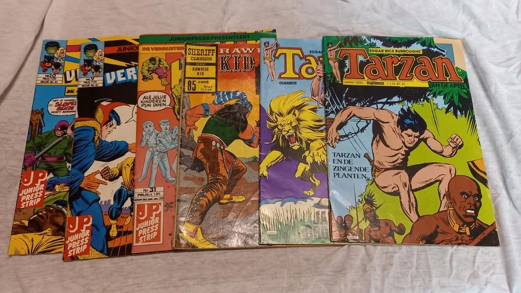 Zes oude strips, verdedigers, hulk, tarzan, rawhide kit, Boeken, Strips | Comics, Meerdere comics, Ophalen of Verzenden, Gelezen