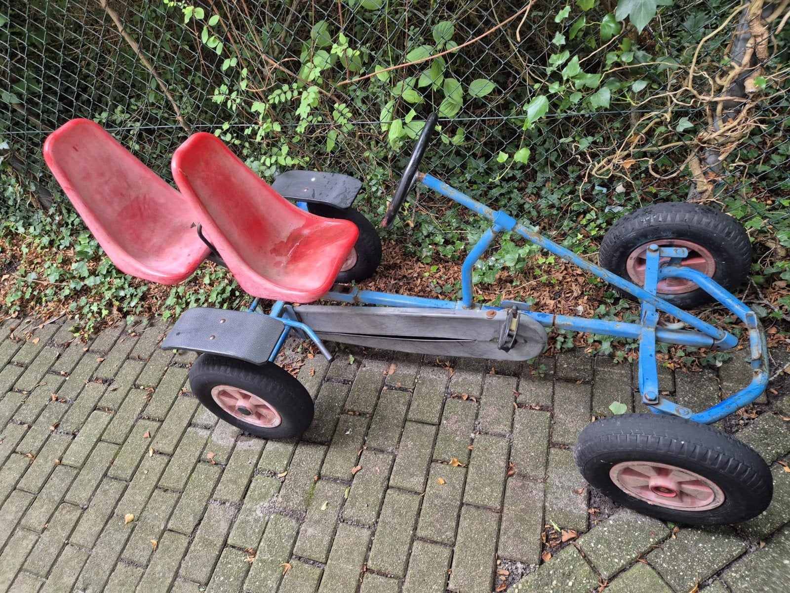 Blauwe skelter met duozit - Gebruikt, Kinderen en Baby's, Ophalen, Gebruikt, Overige merken, Duozit