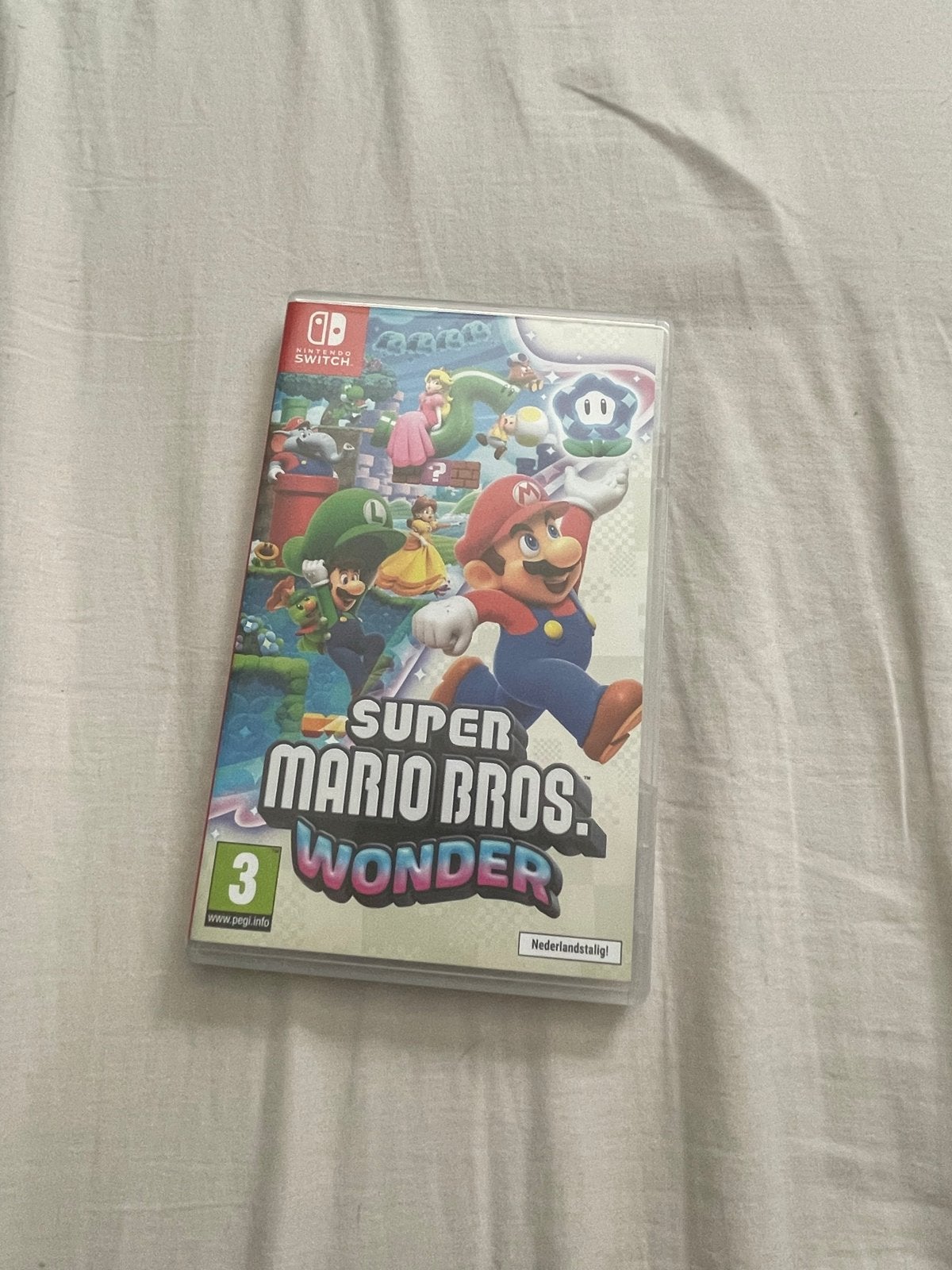 Super Mario Bros. Wonder - Nintendo Switch (Nederlandstalig), Spelcomputers en Games, Eén computer, Ophalen of Verzenden, Zo goed als nieuw