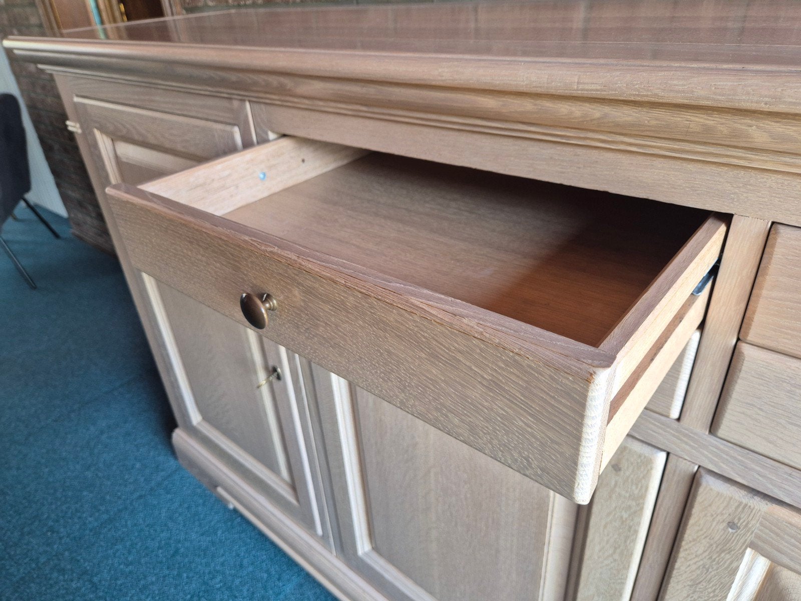 Eikenhouten dressoir, Ophalen