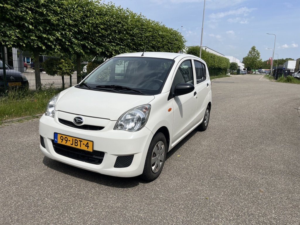 Daihatsu Cuore 1.0 Premium Automaat 5D Elektr pakket Apk, Automaat, Stof, Zwart, 18 €/maand