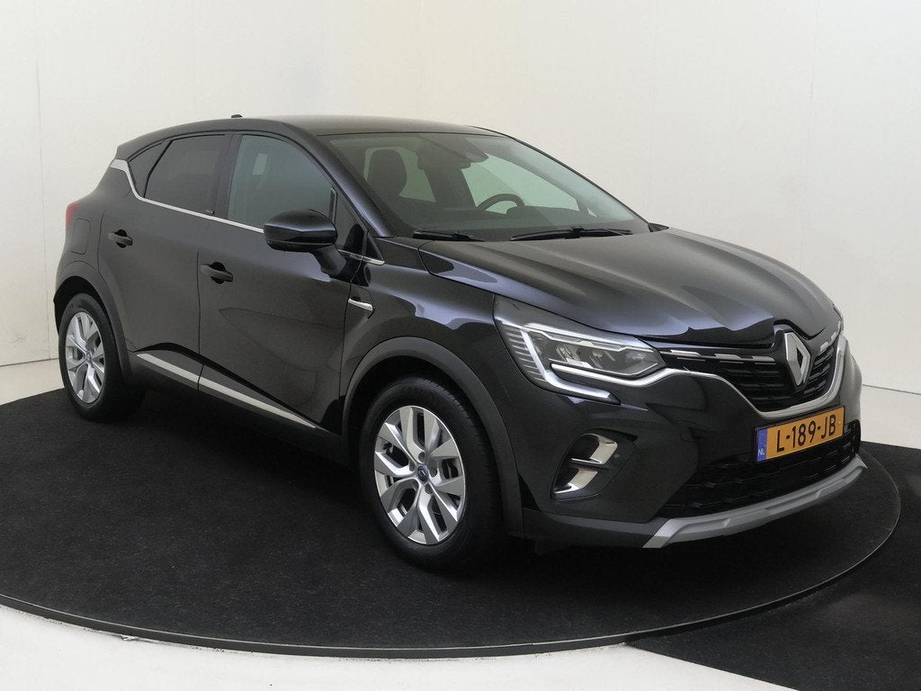 Renault Captur 1.6 E-Tech Plug-in Hybrid 160 Intens Automaat, Auto's, Renault, Stof, Gebruikt, 4 cilinders, Zwart