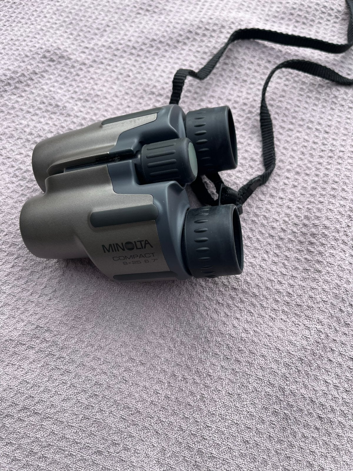 Minolta Compact 10x25 6.7 verrekijker met tasje, Gebruikt, Dakkant (recht), Ophalen of Verzenden, 8 tot 12x