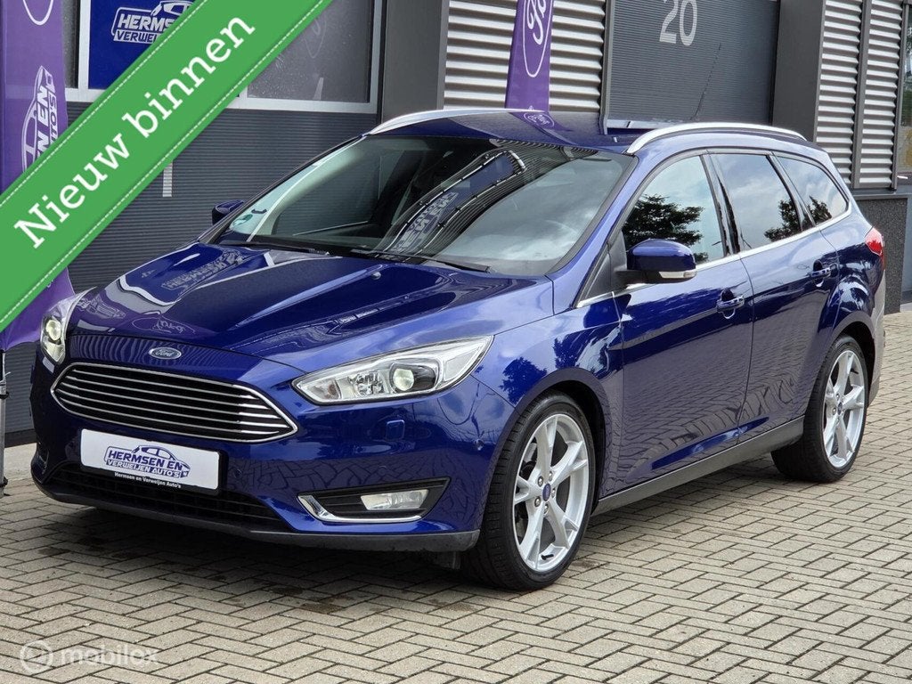 Ford Focus Wagon 1.5 EcoBoost 150pk Titanium nw. distributie, Zwart, 150 pk, Blauw, Leder en Stof