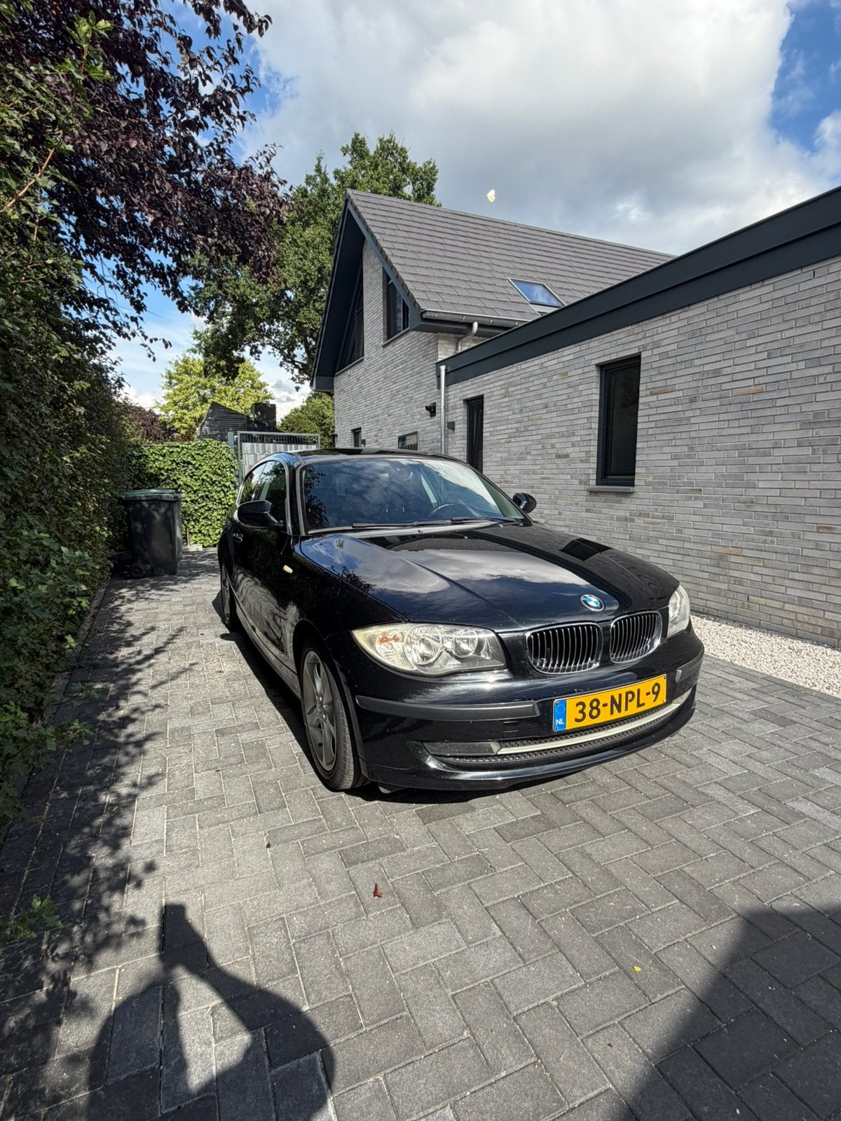 BMW 1-Serie 2.0 116i Business line 2010 Zwart, Auto's, 1-Serie, 1995 cc, Zwart, 4 cilinders