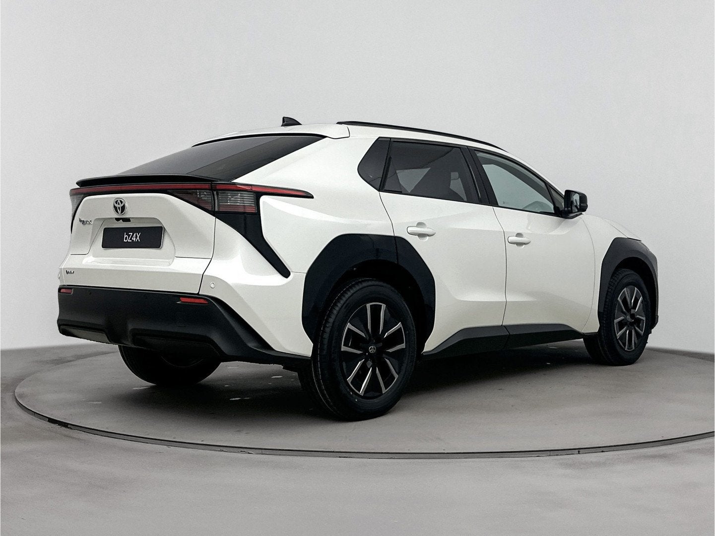 Toyota Bz4x Dynamic 73 kWh (bj 2026, automaat), Auto's, Zwart, Leder en Stof, Wit, Automatische klimaatregeling