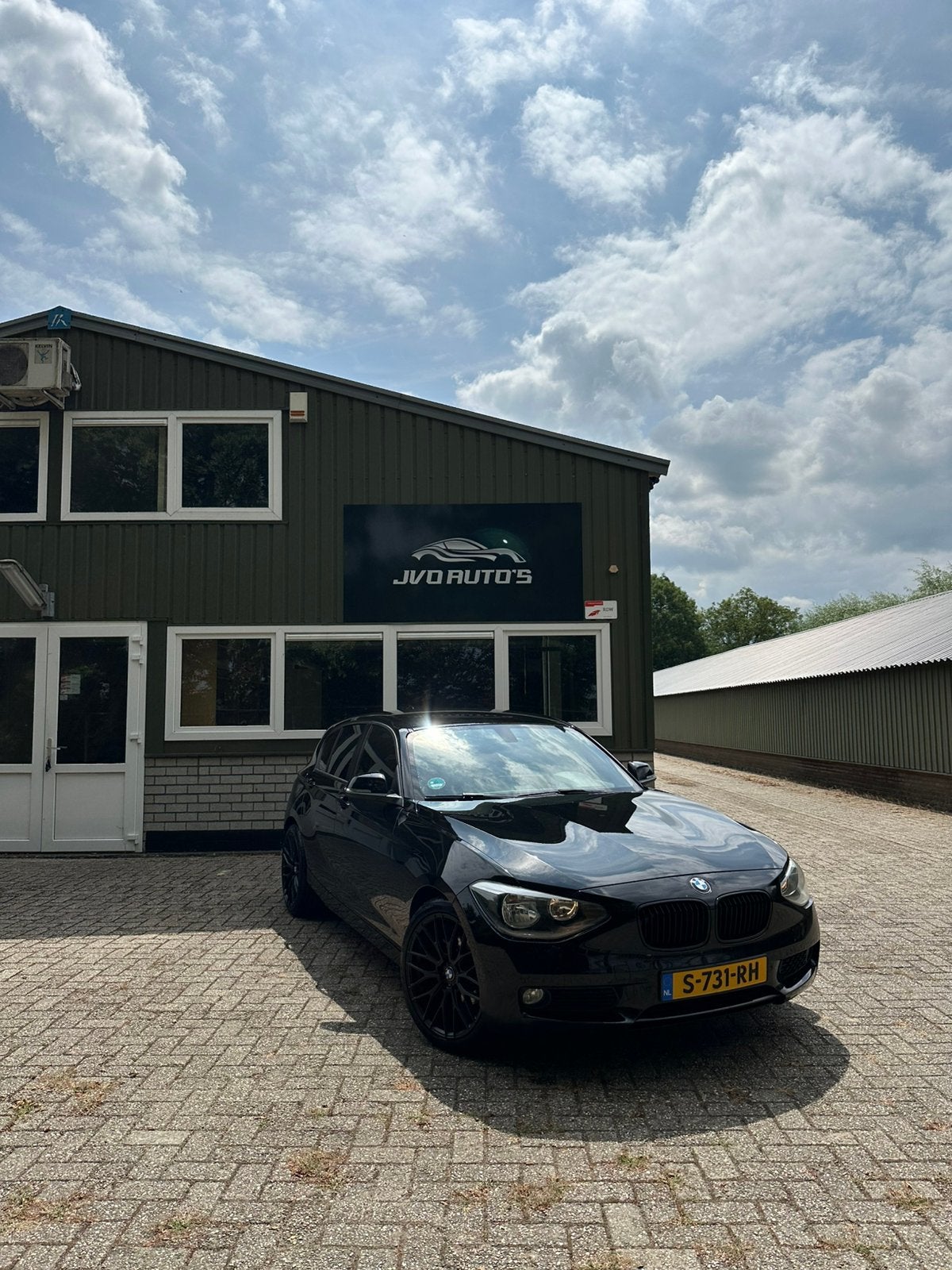 BMW 1-Serie 116I 100KW 5DR 2011 Zwart, Auto's, 1-Serie, 4 cilinders, Zwart, 1265 kg