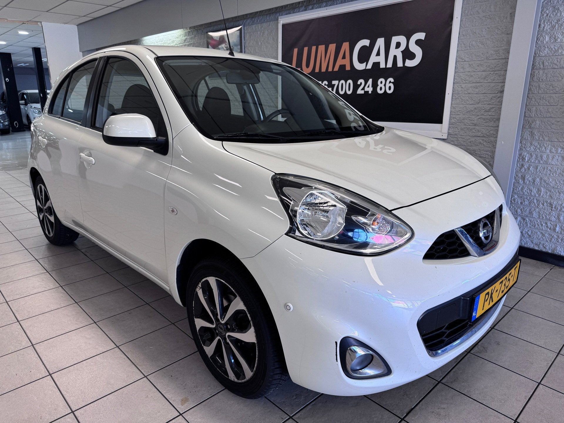 Nissan Micra 1.2 Tekna | Cruise | PDC | Navi | Clima | Airco, Auto's, Nissan, Voorwielaandrijving, Euro 5, Gebruikt, 31 €/maand