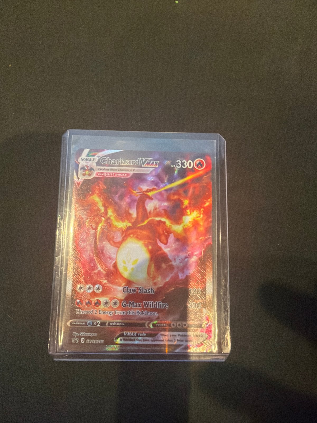 Charizard VMAX Pokémon kaart (Gigantamax), Ophalen of Verzenden, Zo goed als nieuw, Losse kaart