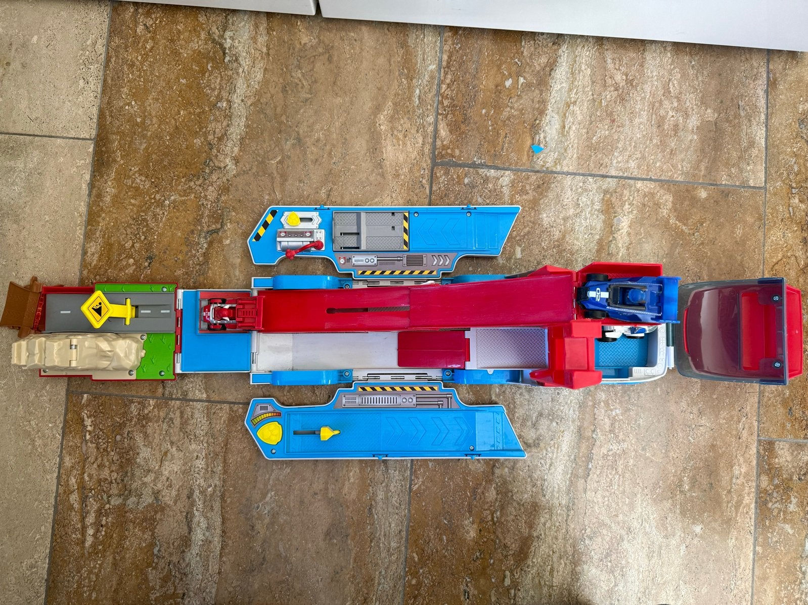 Paw Patrol Racebaan Truck - Paw Patroller Launch ‘n haul, Ophalen of Verzenden, Zo goed als nieuw