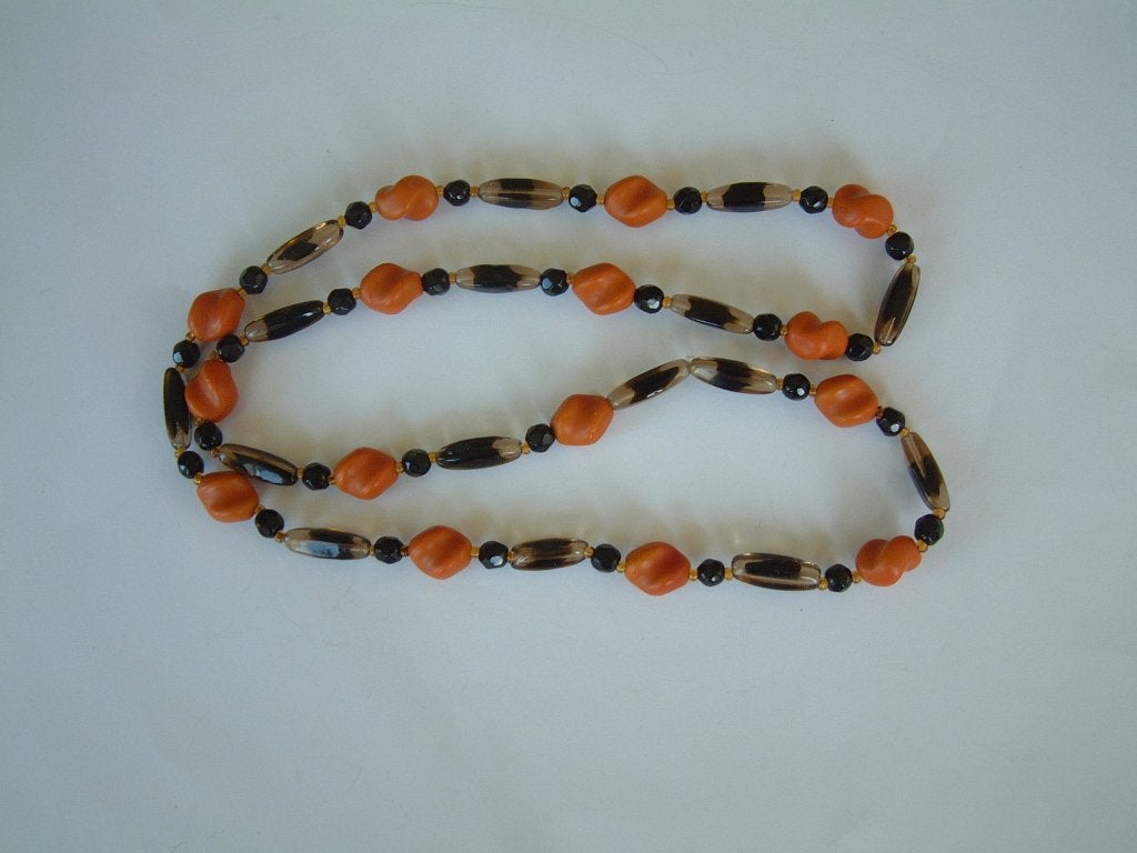 oud snoer nr.2 oranje met bruin glas kralen, Ophalen of Verzenden, Zo goed als nieuw, Overige kleuren, Overige materialen