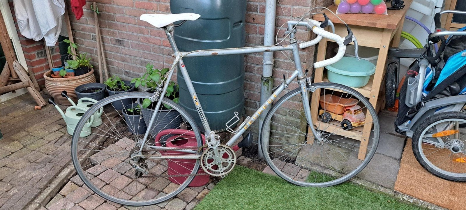 Race fiets peugeot met nieuw zadel, Ophalen