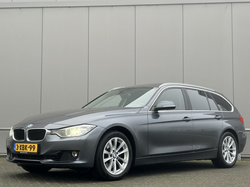 BMW 3 Serie Touring 330d xDrive - pano - navi - cruise - air, Euro 5, Zwart, 2993 cc, Leder
