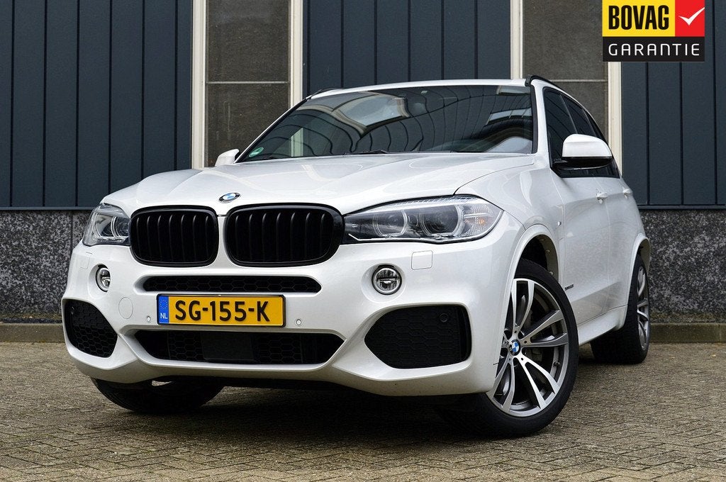BMW X5 xDrive50i High Executive 7p. Rijklaarprijs-Garantie P, Auto's, BMW, Automaat, Gebruikt, 7 stoelen, Wit