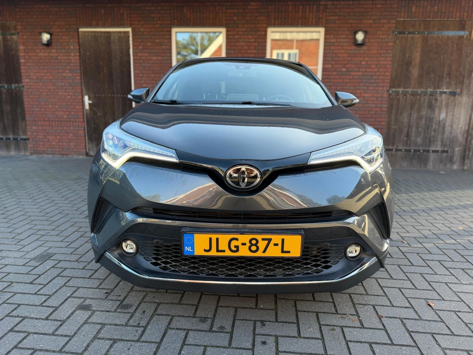 Toyota C-HR 1.2 Executive Automaat |ACC| Camera| Leder| DAB|, Auto's, Dealer onderhouden, Gebruikt, Zwart, 4 cilinders