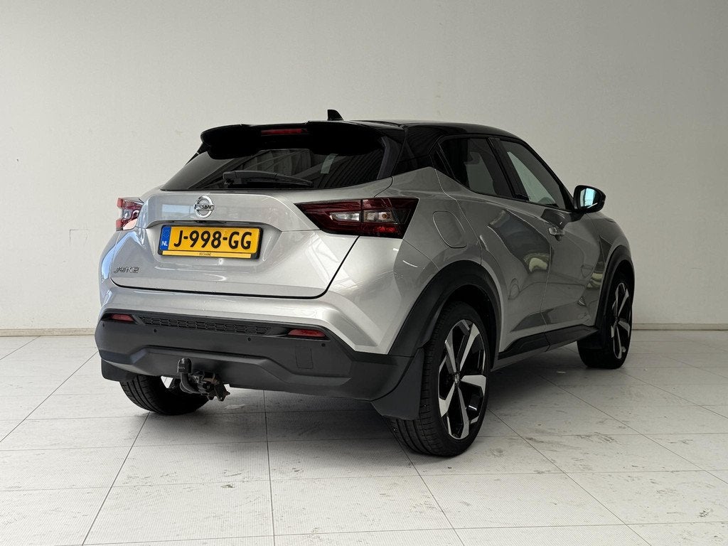 Nissan Juke 1.0 DIG-T Premiere Edition | Navigatie | Camera, Auto's, Nissan, Stof, Automatische klimaatregeling, Met garantie (alle)