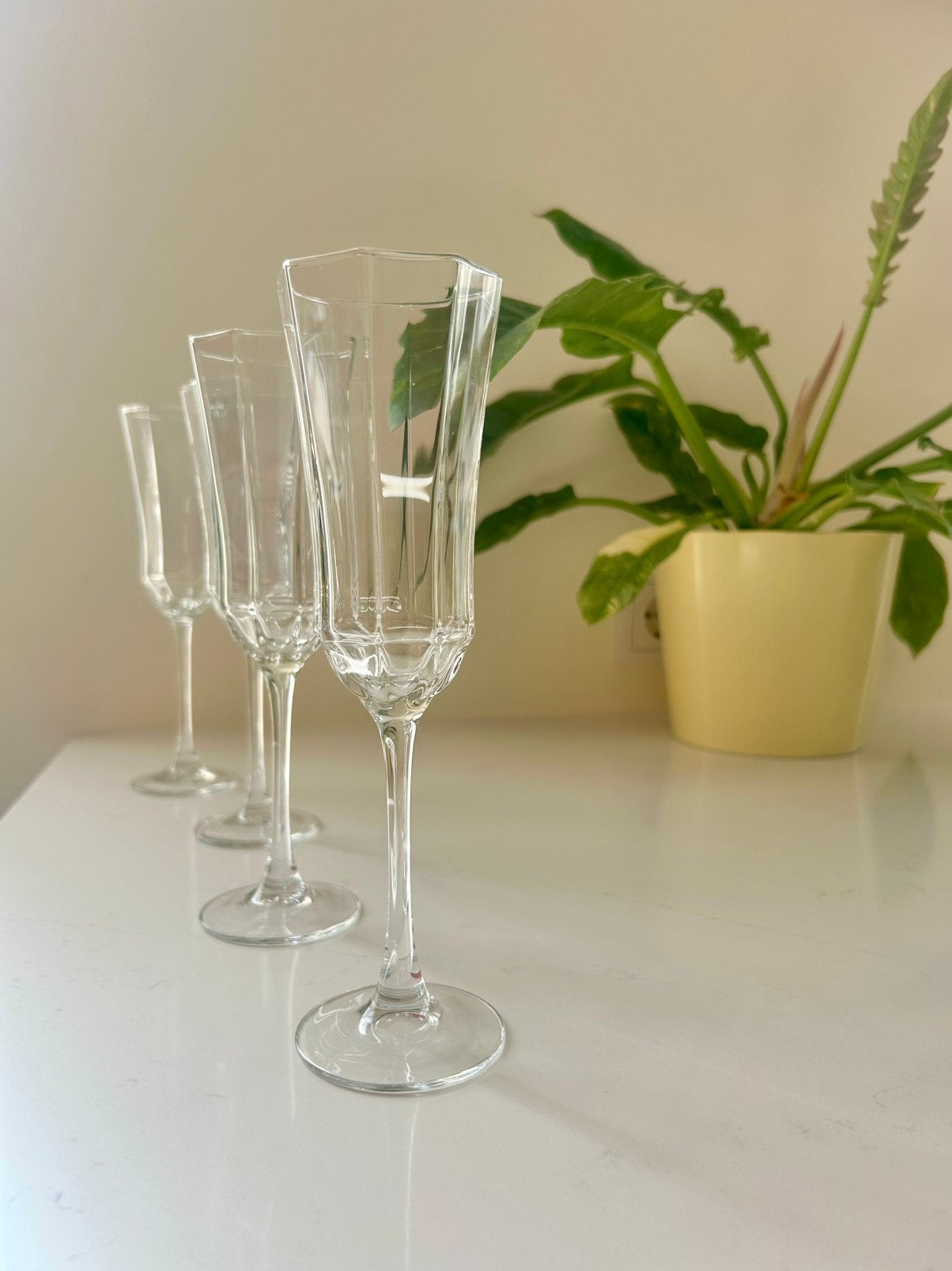 4 retro champagne flutes. Luminarc octime helder, Ophalen of Verzenden, Zo goed als nieuw, Overige typen