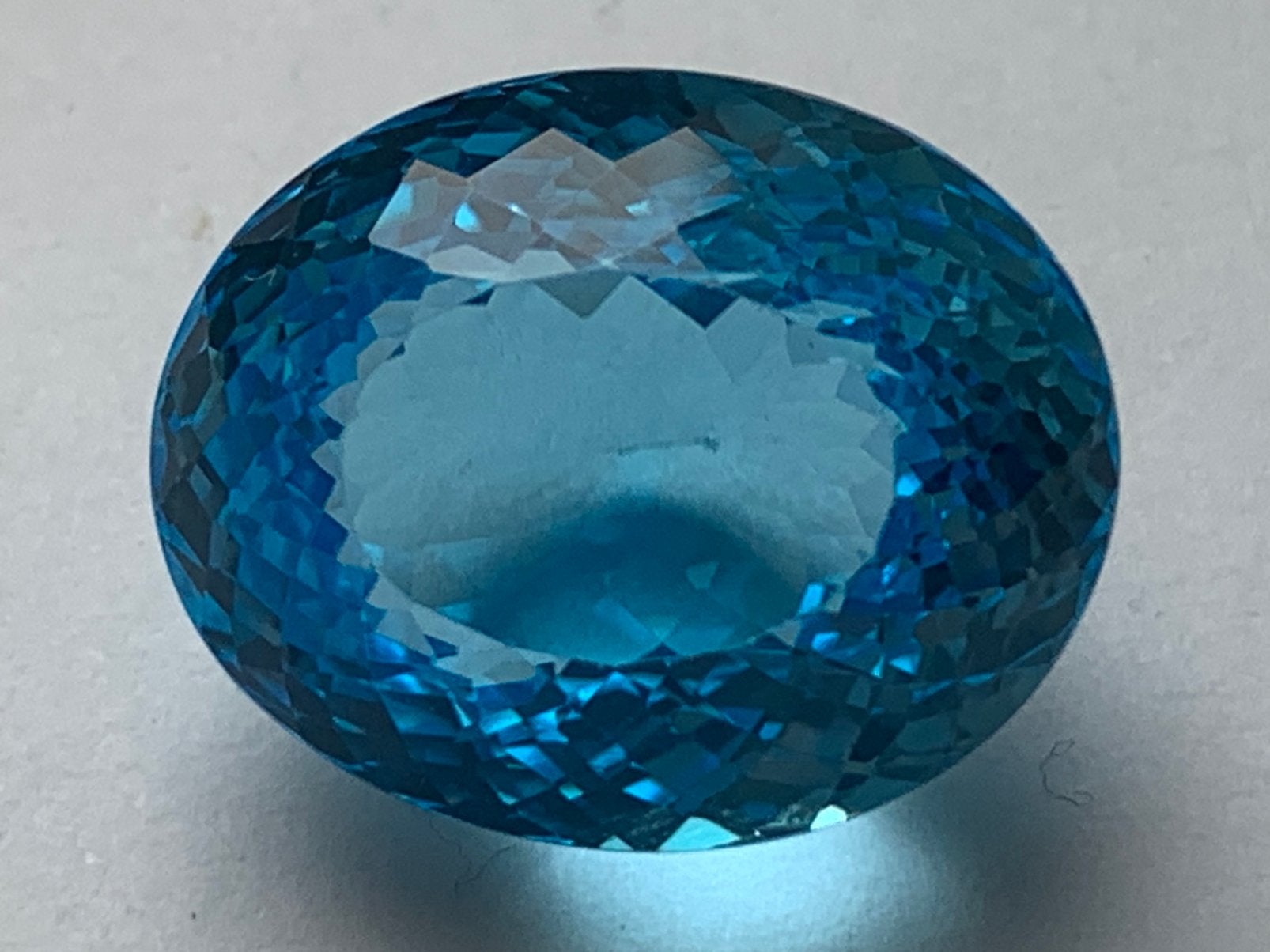 Prachtige topaas swiss blue 33,40 crt met certificaat, Sieraden, Tassen en Uiterlijk, Edelstenen, Ophalen of Verzenden, Zo goed als nieuw