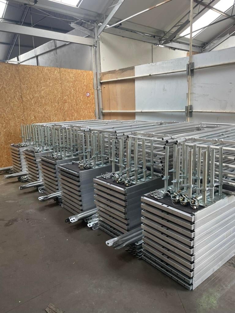 Aluminium Steiger Stelling 100m2 NIEUW!, Ophalen of Verzenden, Nieuw, Gevelsteiger, 5 meter of hoger