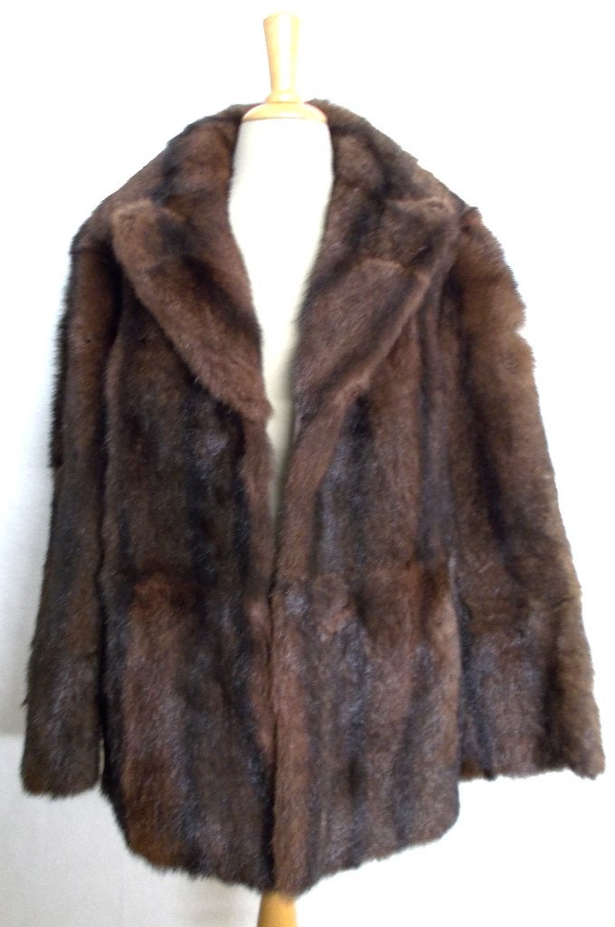 Bruin/zwarte mooie echte bontjas! M/L, Kleding | Dames, Jassen | Winter, Verzenden, Zo goed als nieuw, Maat 38/40 (M), Bruin